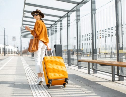 young lady traveling light with luggage